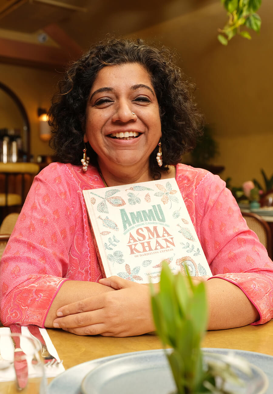 Asma with her book AMMU.